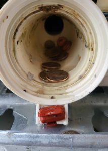 Coins stuck in washing machine