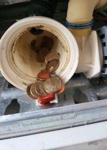 Coins stuck in washing machine