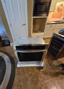 A newly unboxed Samsung wall oven, ready to be installed