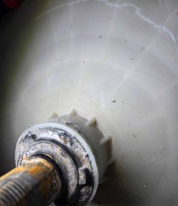 Close-up on underside of washing machine drum