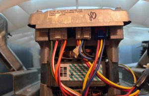 Close-up shot of electrical components of washing machine